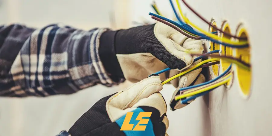 Electrician performing full house rewiring in a London property